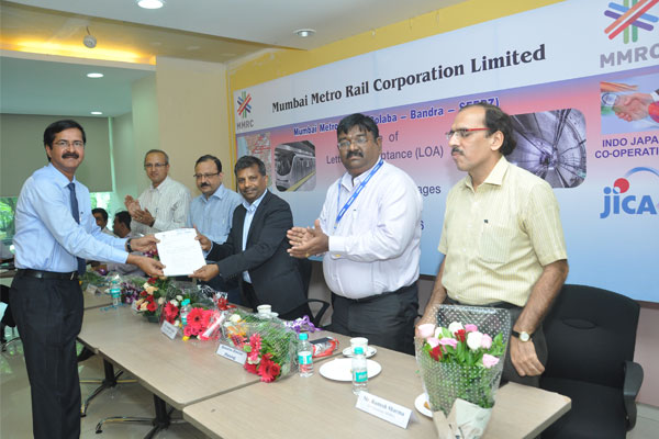 Contractor recieveing LOA from the hands of MR. S.K.Gupta, Director (Projects)
