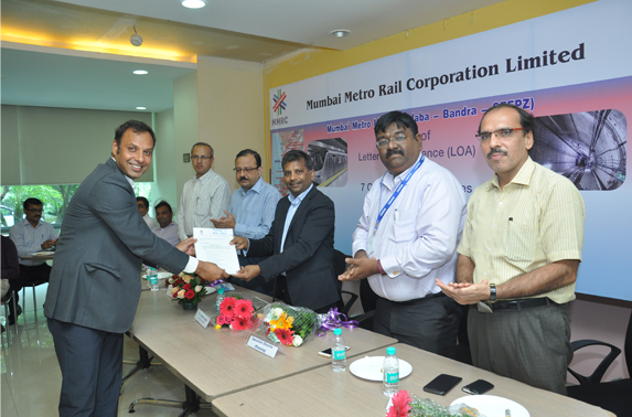 Contractor recieveing LOA from the hands of MR. S.K.Gupta, Director (Projects)